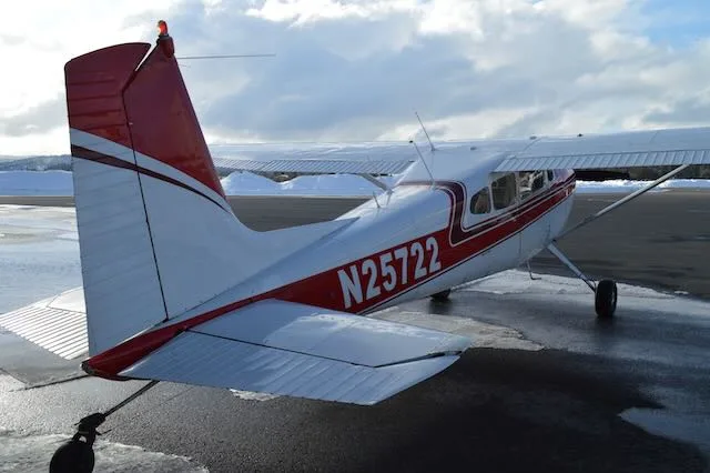 Exterior view of a 1963 Cessna 180F, N25722.