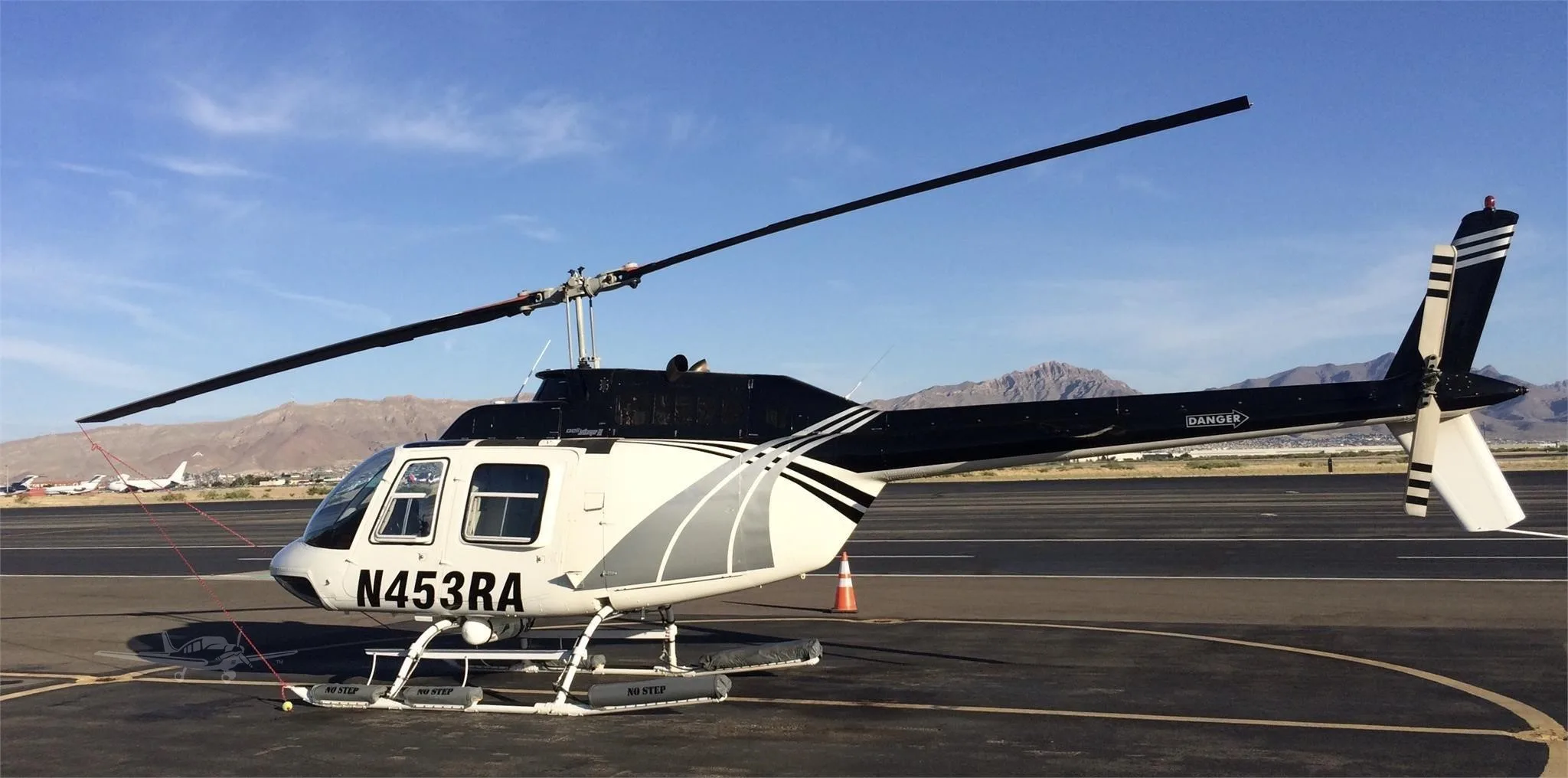 Exterior view of a 1981 BELL 206B III, N453RA.