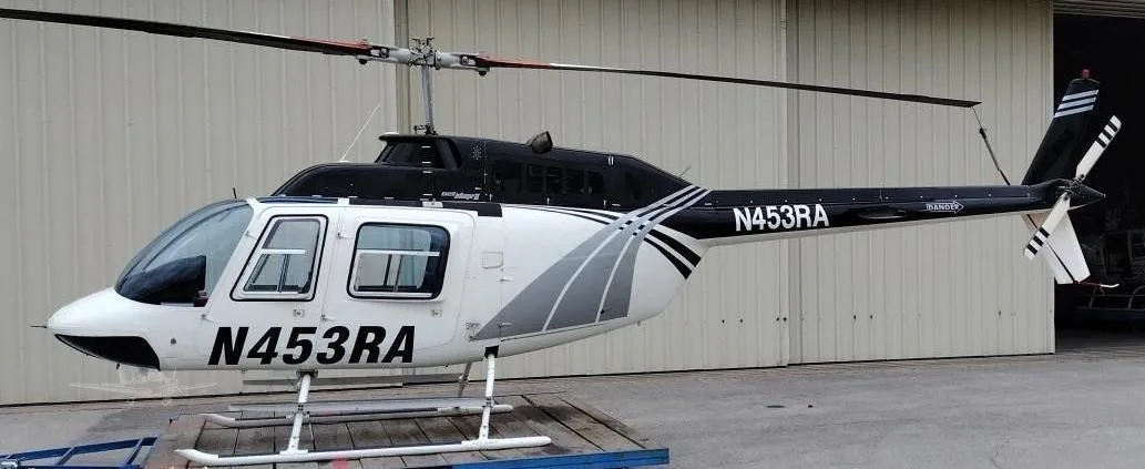 Exterior view of a 1981 BELL 206B III, N453RA.