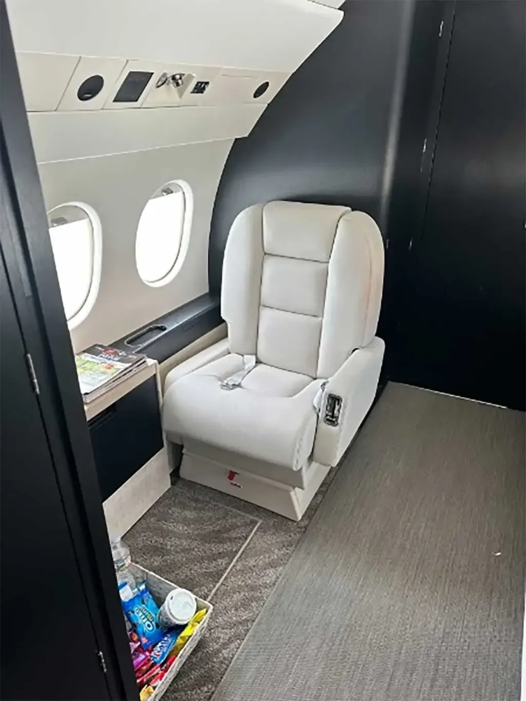 Cabin interior of a 1995 Dassault Falcon 900B.
