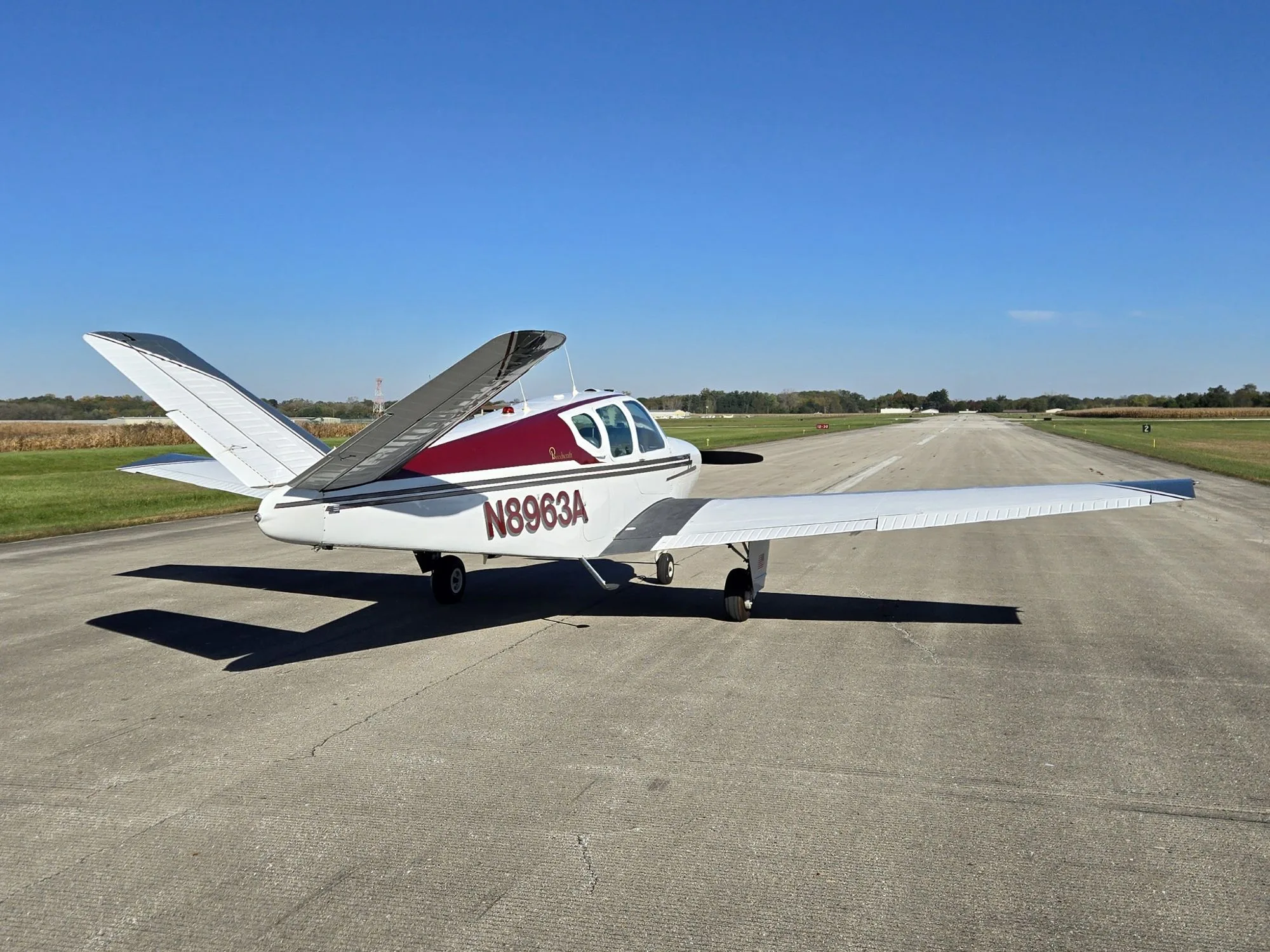 Exterior view of a Beechcraft Bonanza, N8963A.