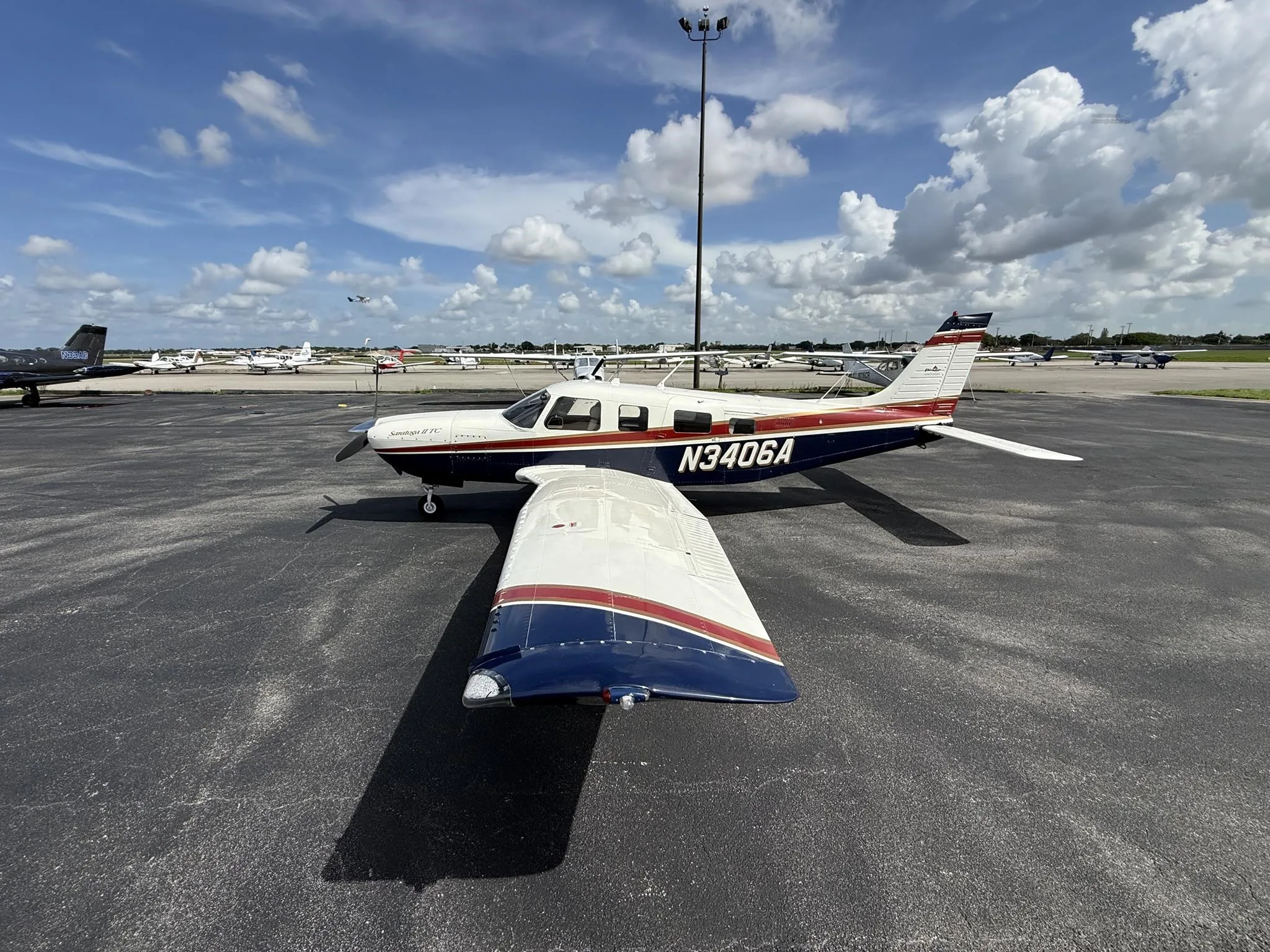 Exterior view of a 1998 PIPER SARATOGA II TC, N3406A.