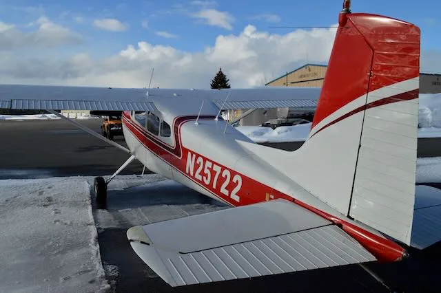 Exterior view of a 1963 Cessna 180F, N25722.