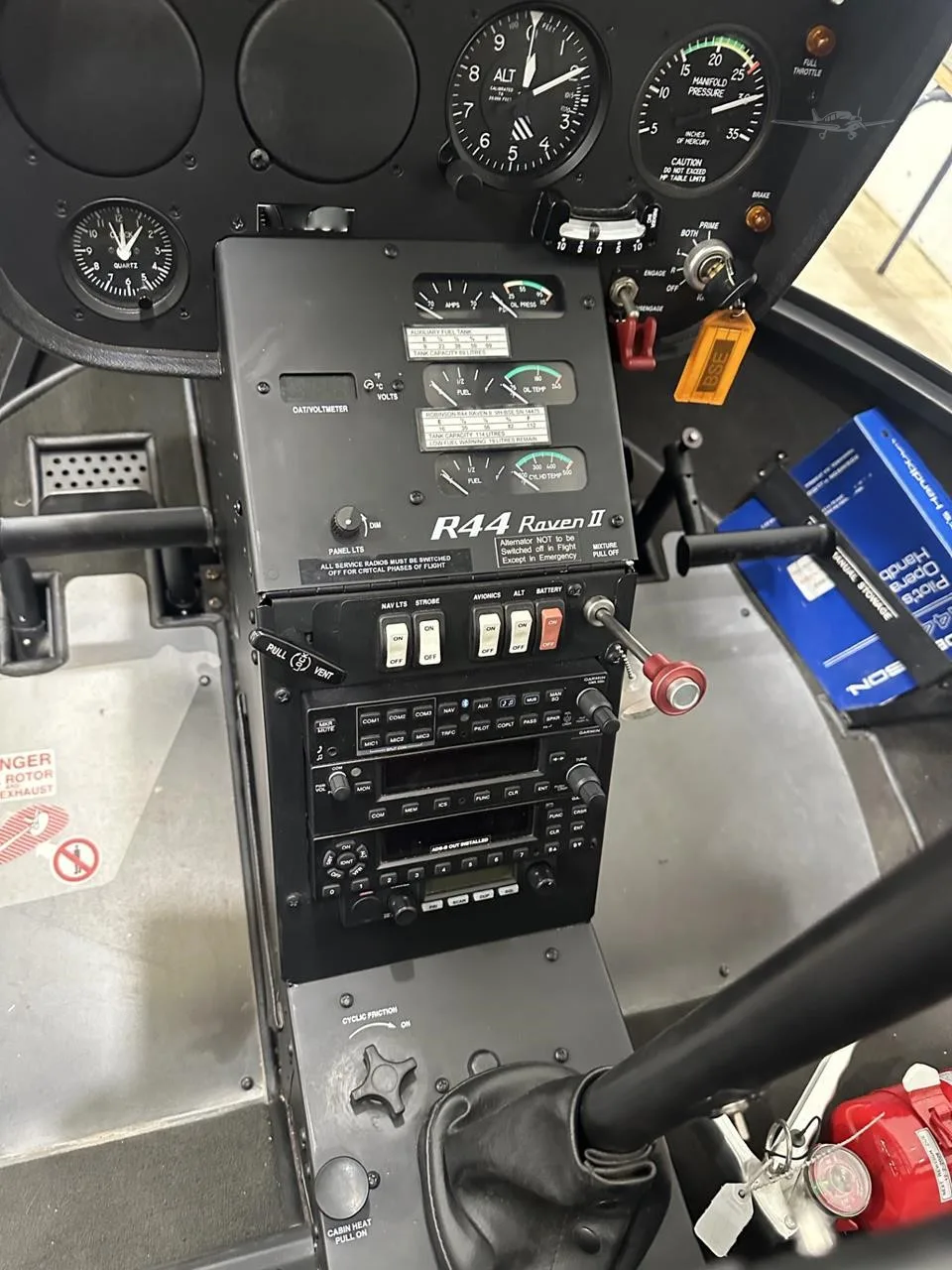 Cockpit and instrument panel of a 2021 ROBINSON R44 RAVEN II.