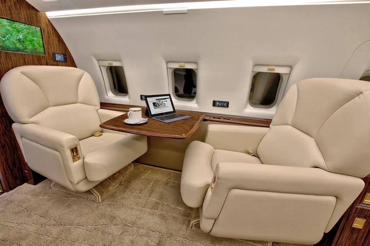 Cabin interior of a 1997 Bombardier Challenger 604 — Thoroughbred Aviation.