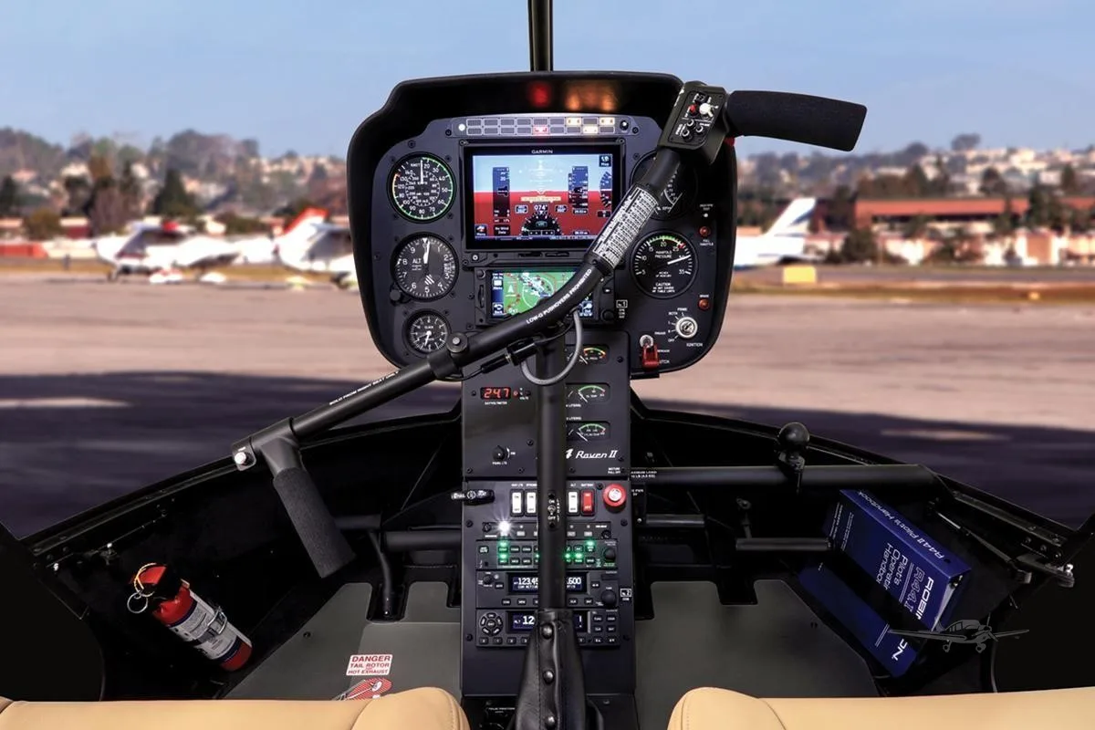 Cockpit and instrument panel of a 2025 ROBINSON R44 RAVEN II.