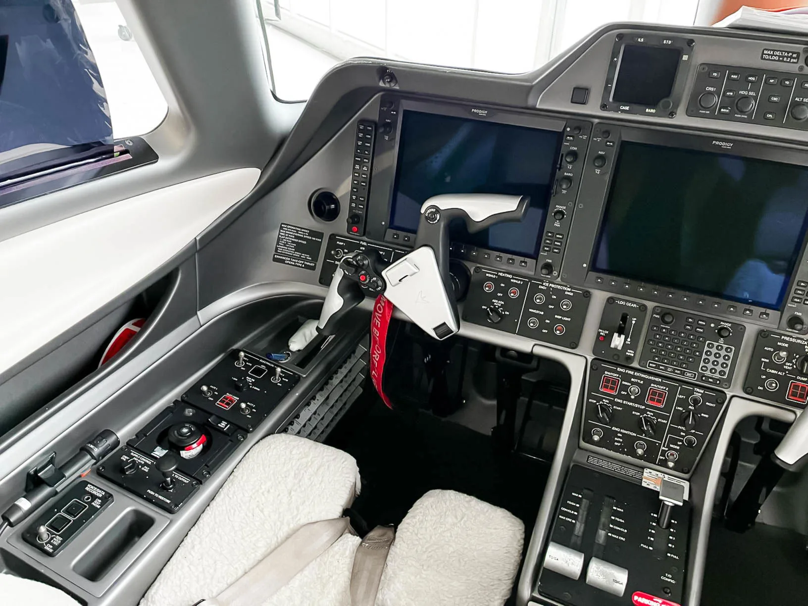 Cockpit and instrument panel of a 2010 Embraer Phenom 100.