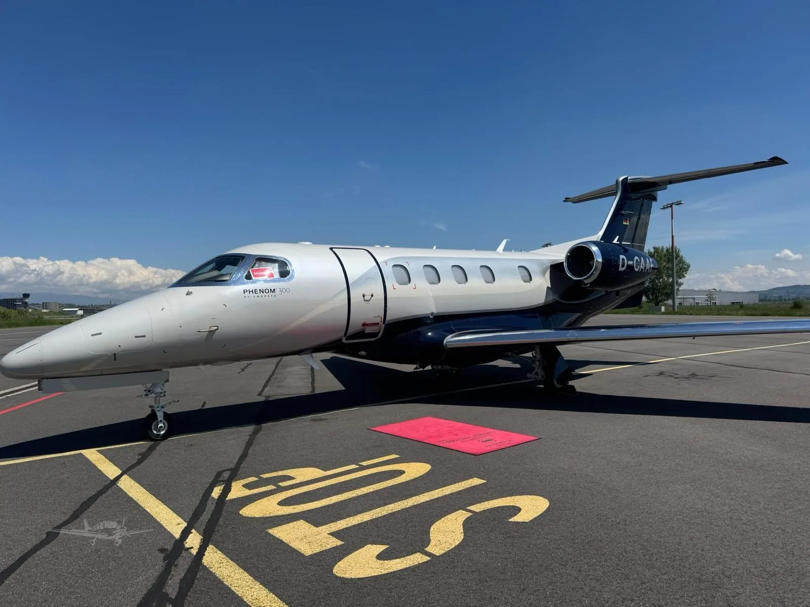 Exterior view of a 2016 EMBRAER PHENOM 300, D-CAAF.