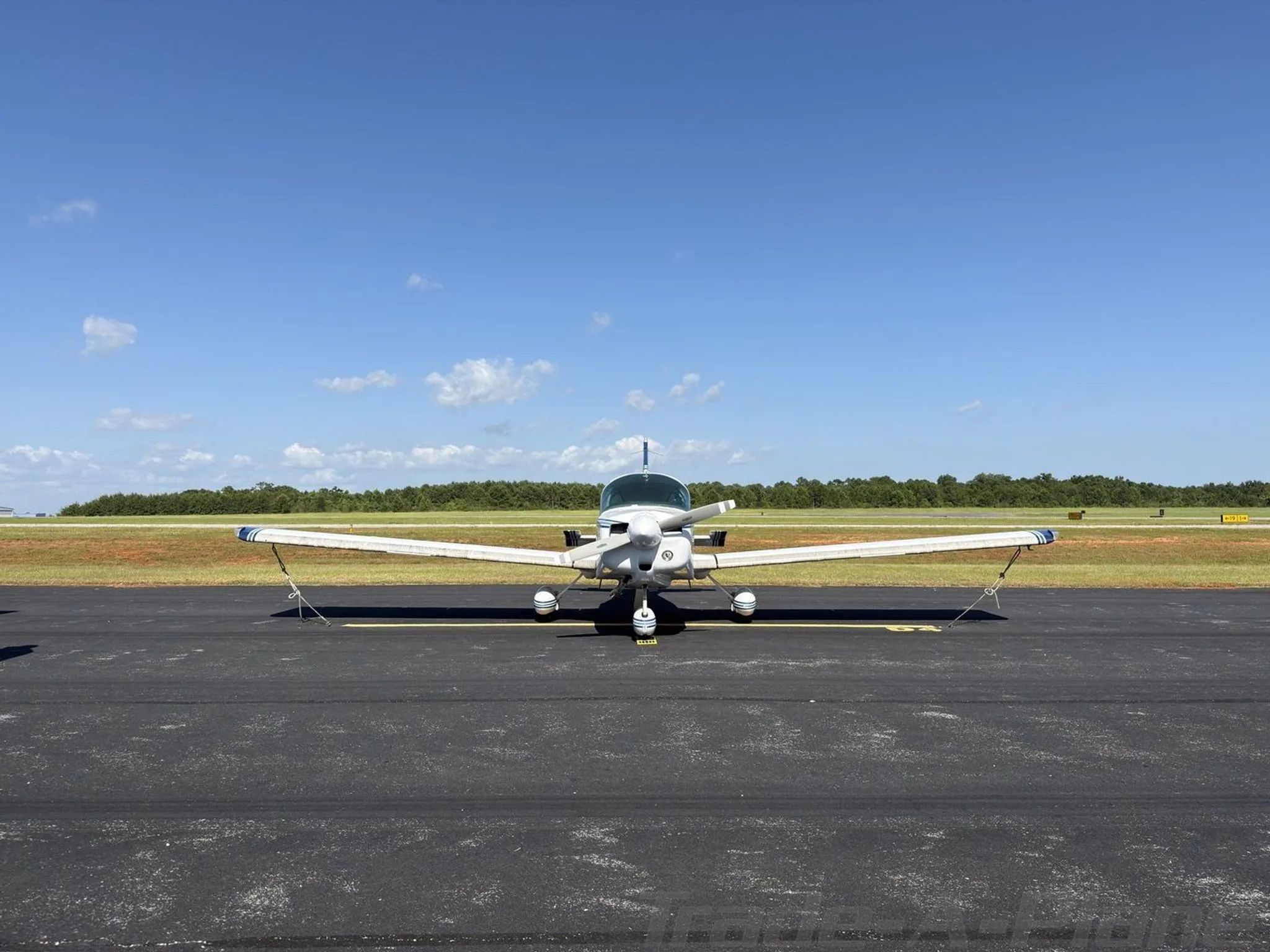 Exterior view of a 1974 GRUMMAN/AMERICAN GENERAL AA5 TRAVELER, N9589L.