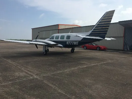 Marketing image of a 1980 Piper Navajo PA-31-325C/R.