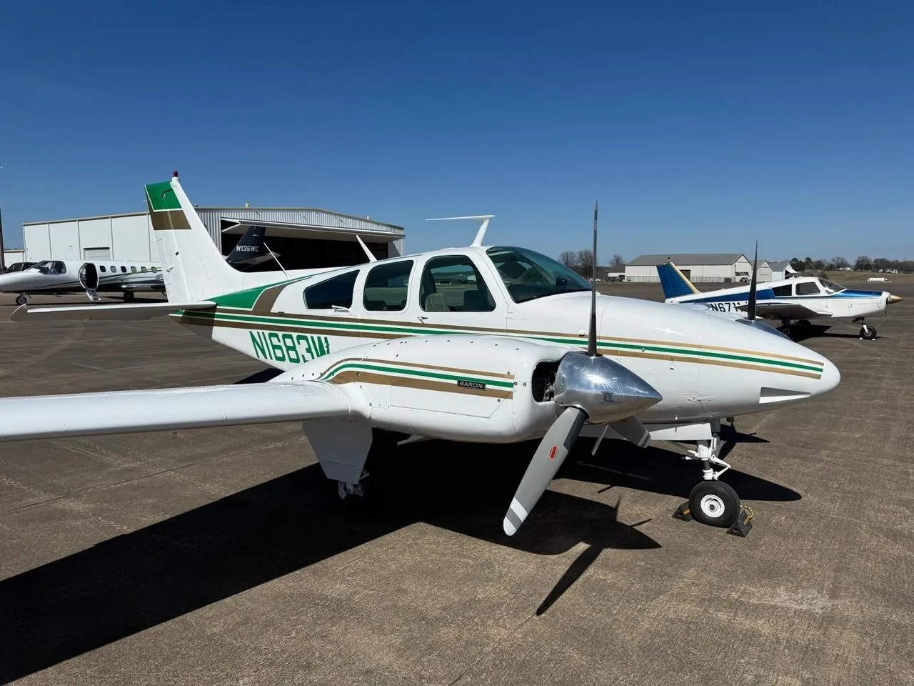 Exterior view of a 1973 BEECHCRAFT B55 BARON, N1683W.