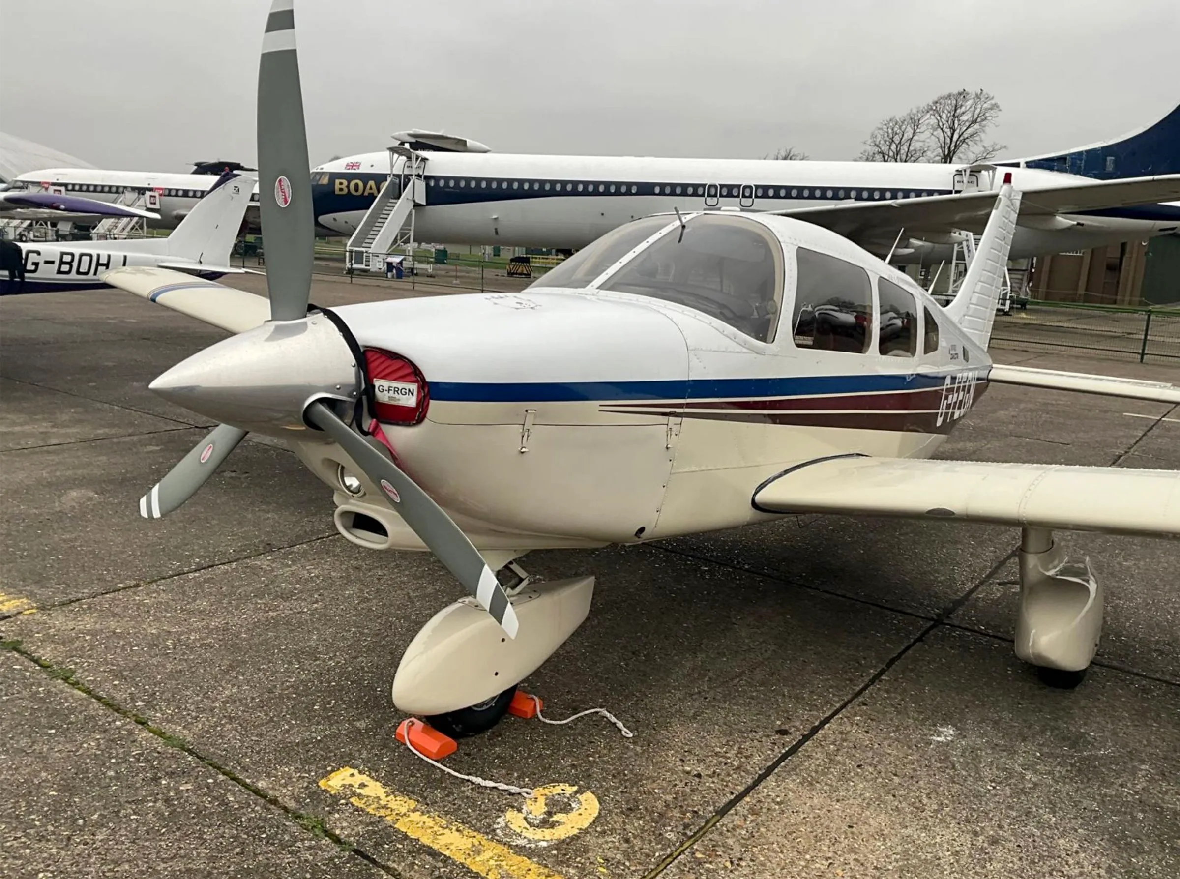 Exterior view of a 1984 Piper PA-28-236 Dakota, G-FEGN.