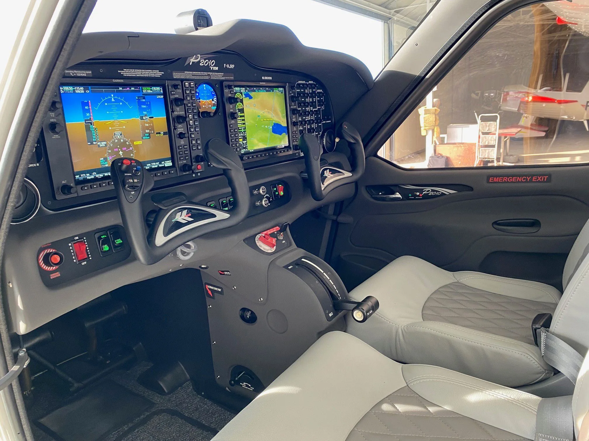 Cockpit and instrument panel of a 2024 Tecnam P2010 TDI.