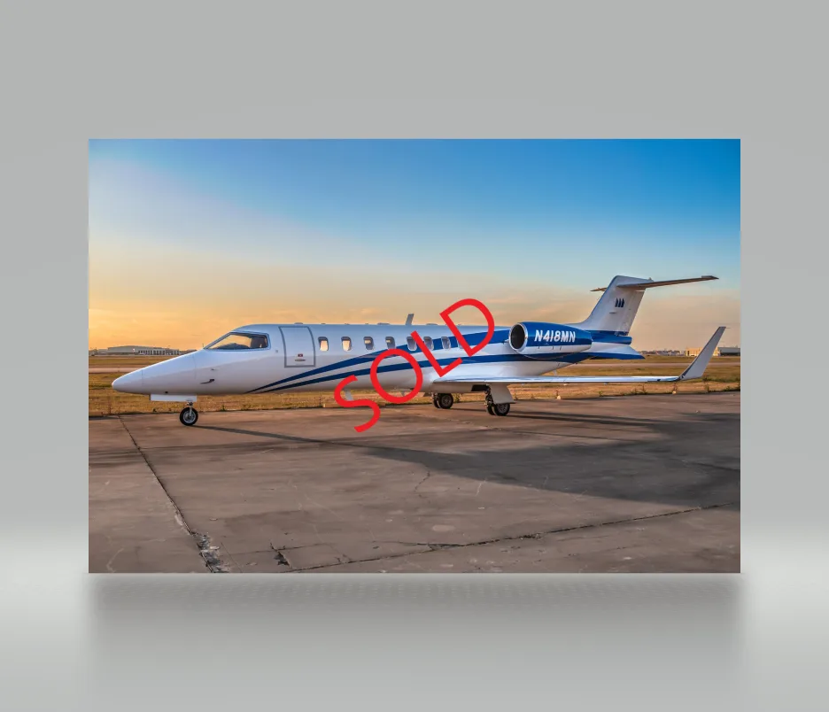 Exterior view of a 2002 Learjet 45, N769TM.