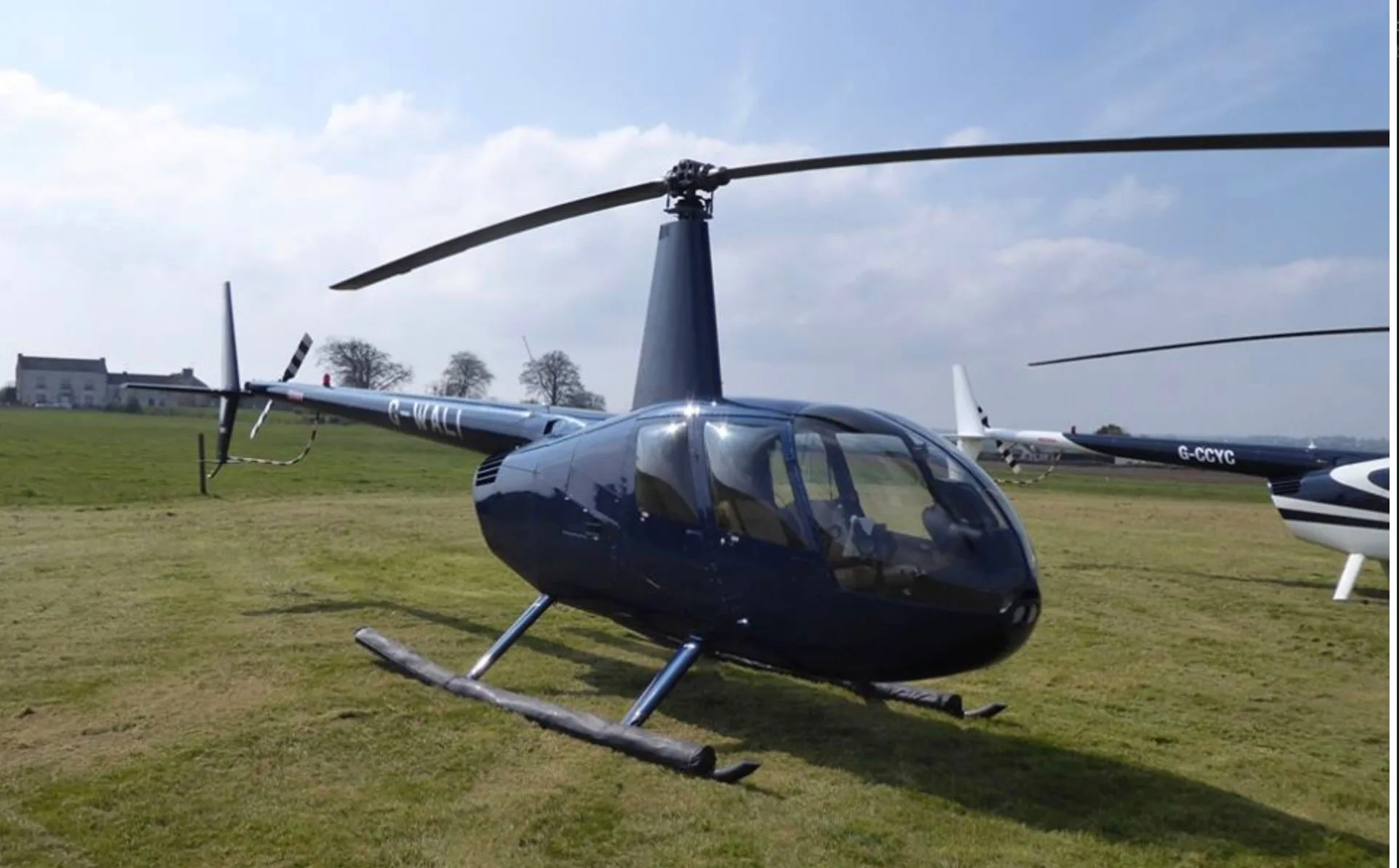 Exterior view of a 2005 Robinson R44 Clipper II.