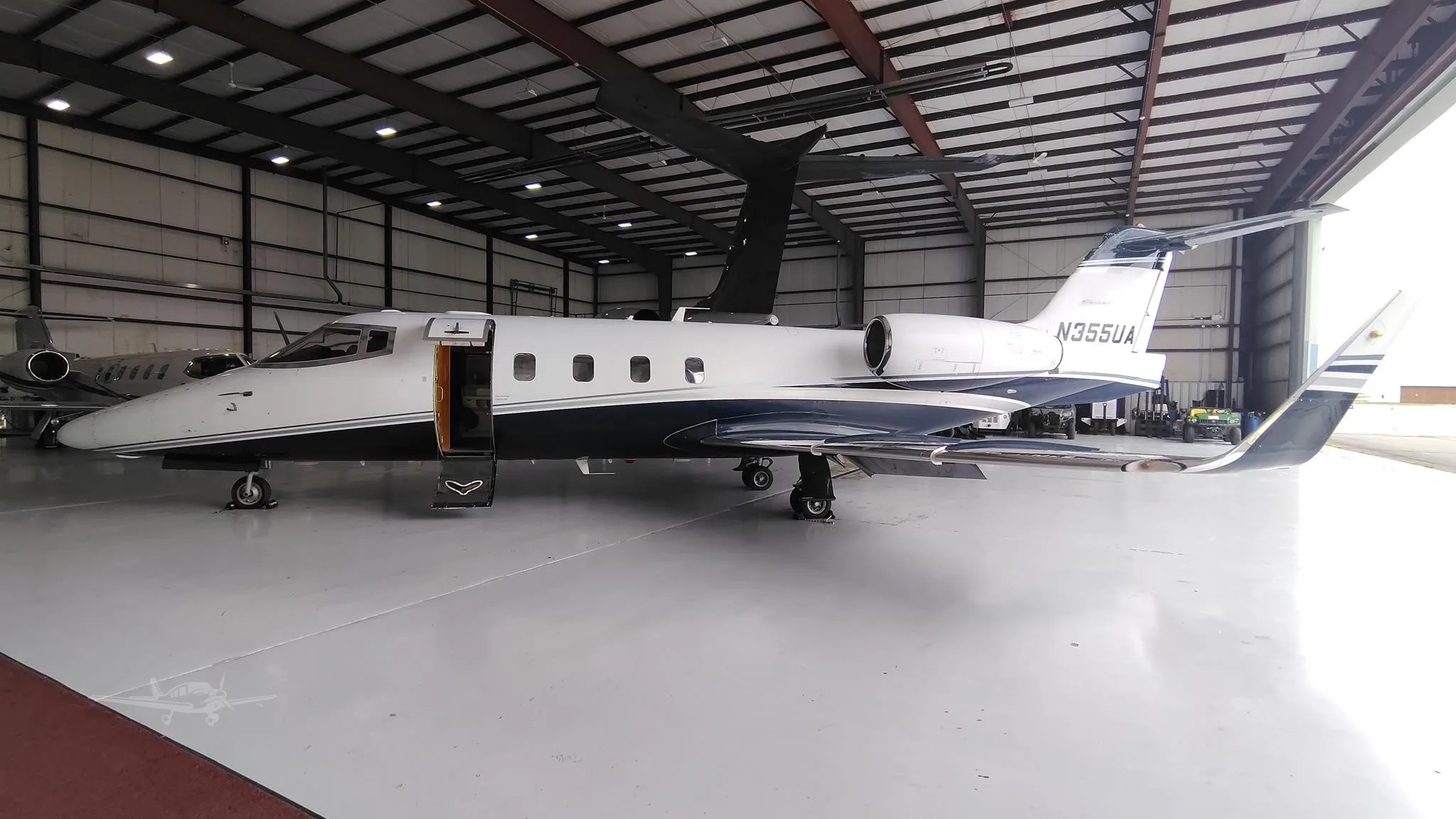 Exterior view of a 1984 LEARJET 55ER, N355UA.