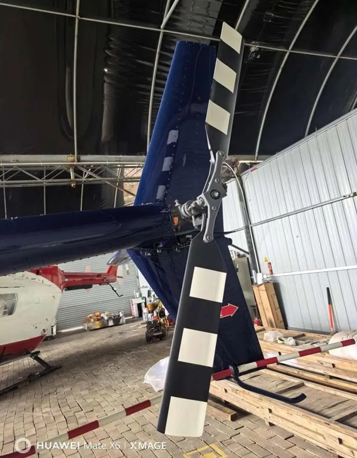 Exterior view of a 2013 ROBINSON R44 RAVEN I.