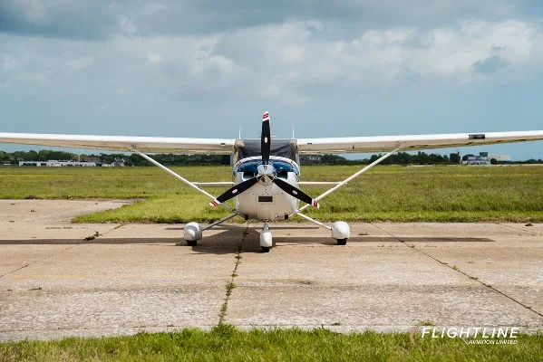 Exterior view of a 2005 Cessna 182T, G-IJAG.