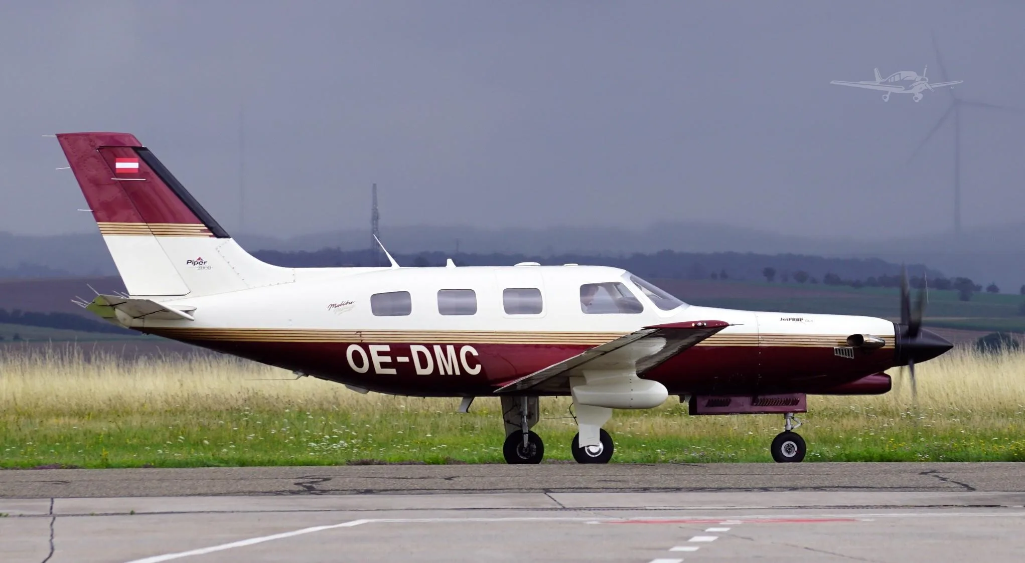 Exterior view of a 2000 PIPER JETPROP, OE-DMC.