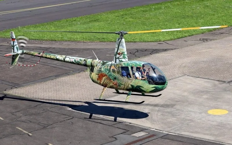 Exterior view of a 2005 Robinson R44 Raven II.