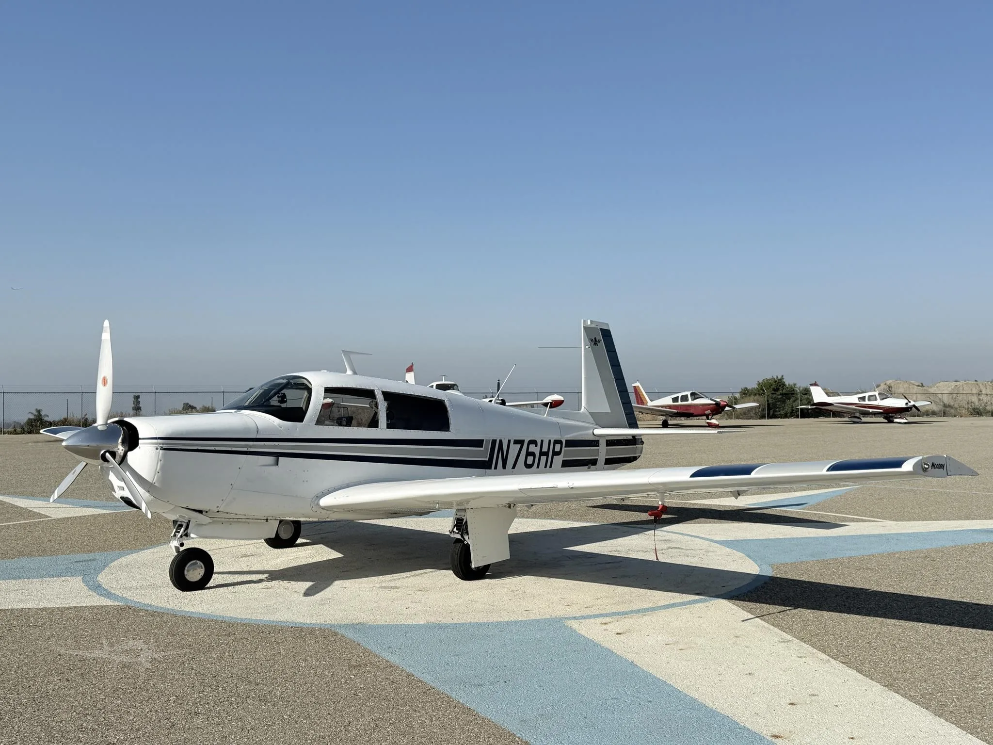 Exterior view of a 1970 MOONEY M20F, N76HP.