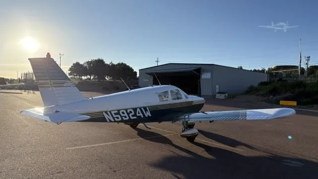 Exterior view of a 1966 PIPER CHEROKEE 180, N5924W.