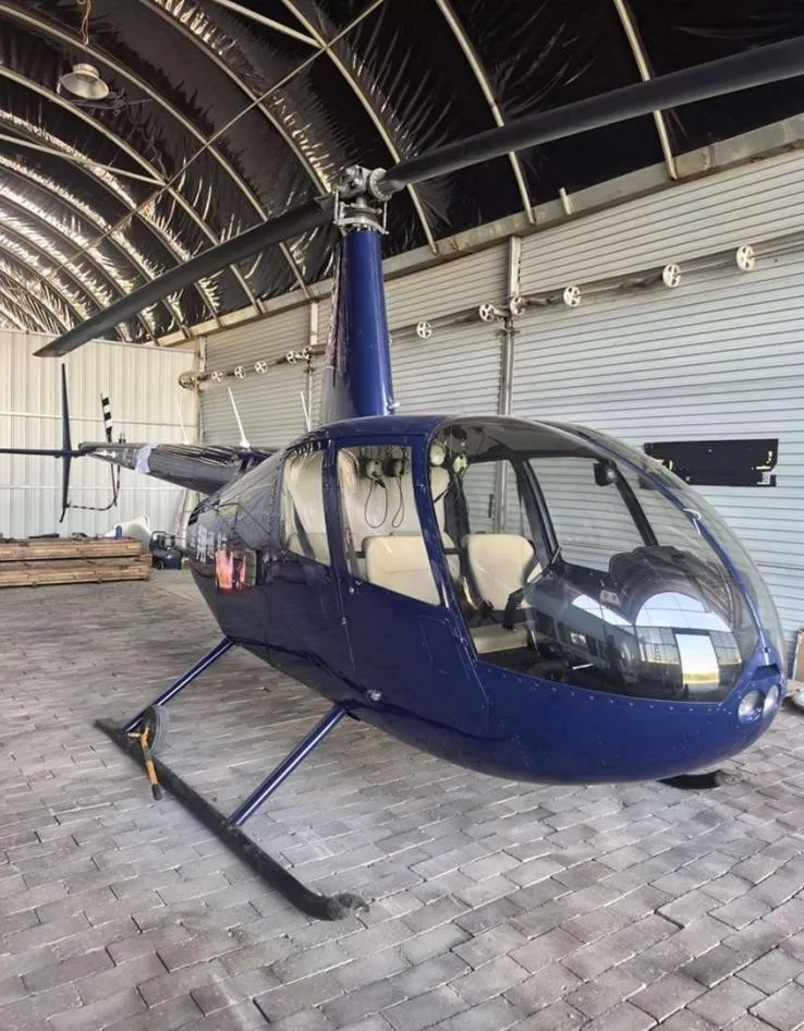 Exterior view of a 2013 ROBINSON R44 RAVEN I.