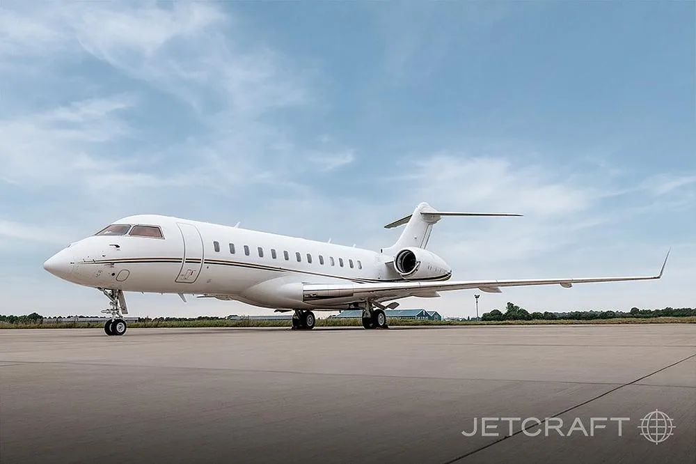 Exterior view of a 2012 Bombardier Global 6000, 9H-AMF.