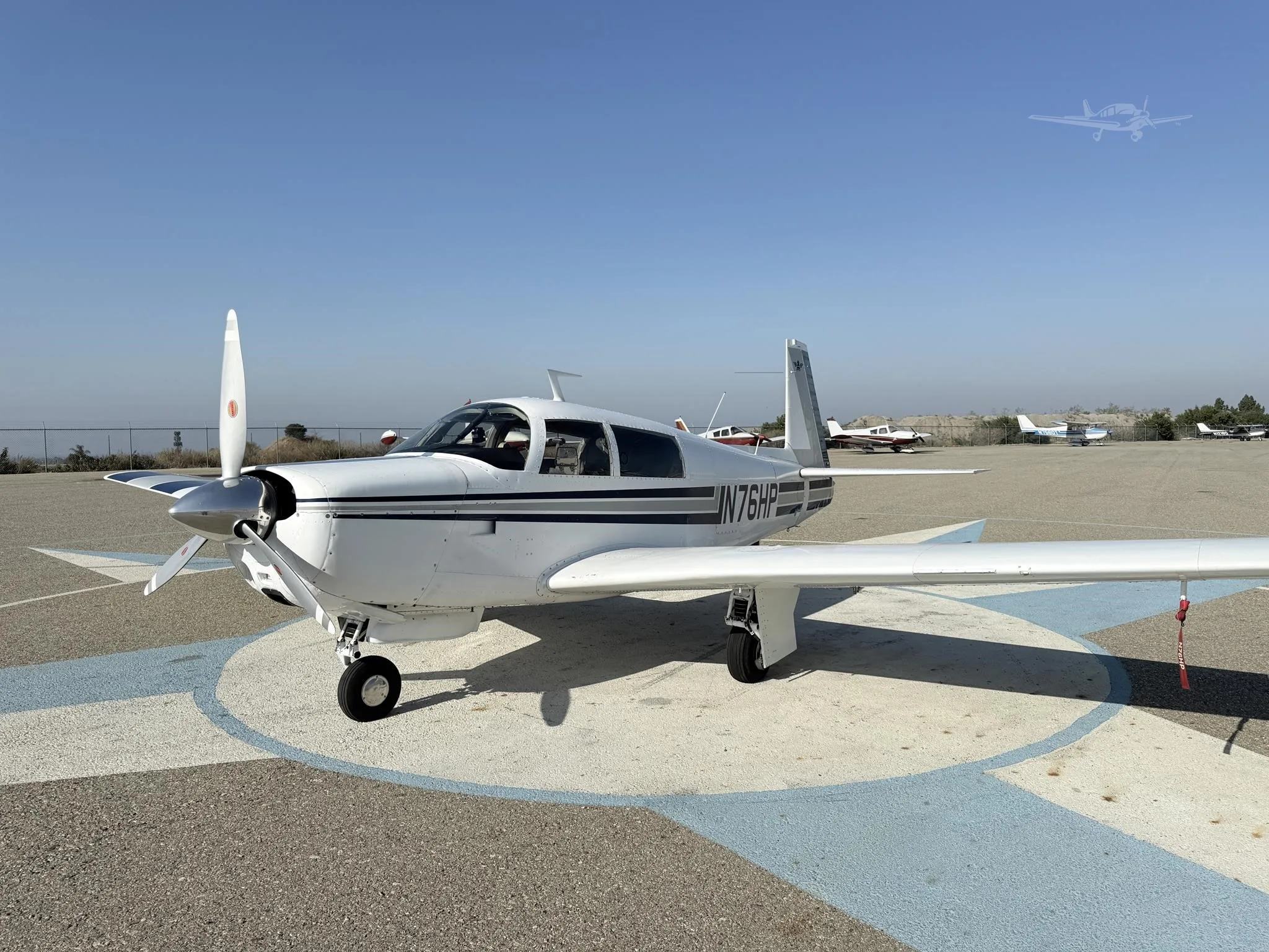 Exterior view of a 1970 MOONEY M20F, N76HP.