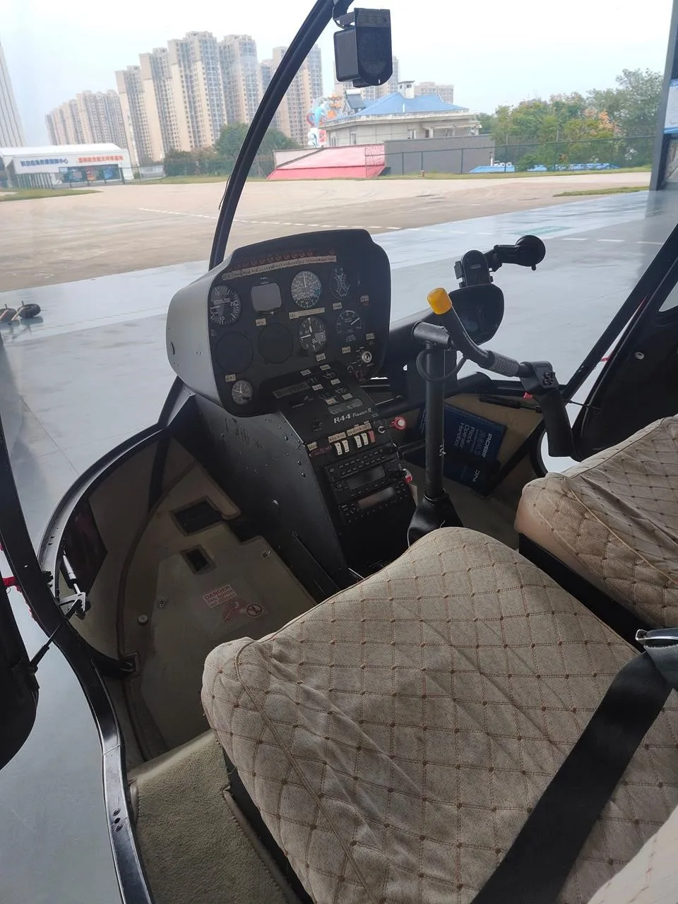 Cockpit and instrument panel of a 2015 ROBINSON R44 RAVEN II.