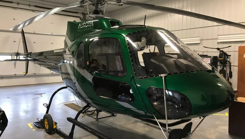 Exterior view of a 1980 Eurocopter AS350B2 1297, C-GYWB.