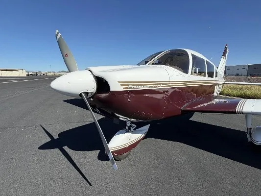 Exterior view of a 1969 Piper Cherokee 235, N9491W.