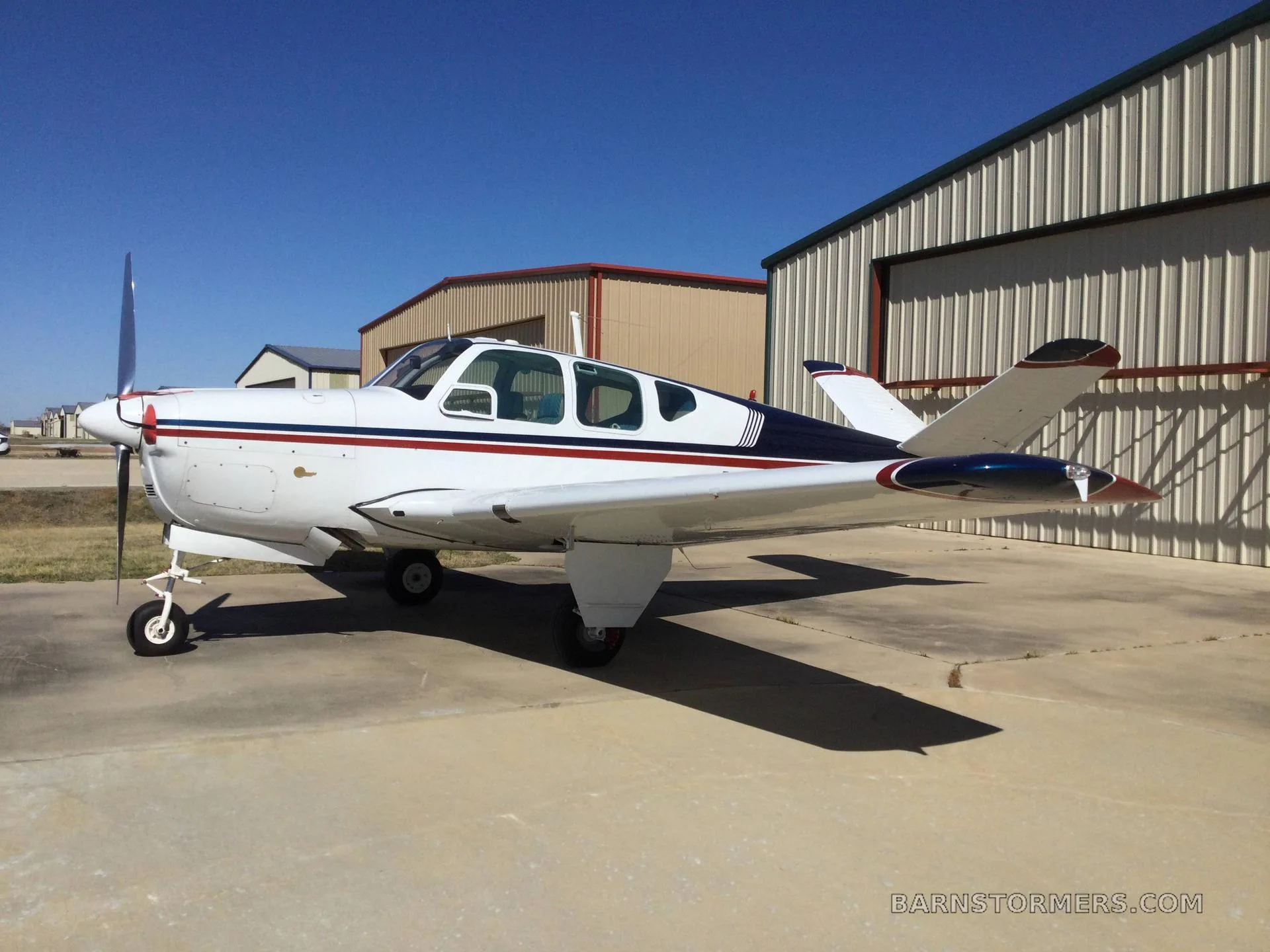 Exterior view of a 1956 Beechcraft BONANZA.