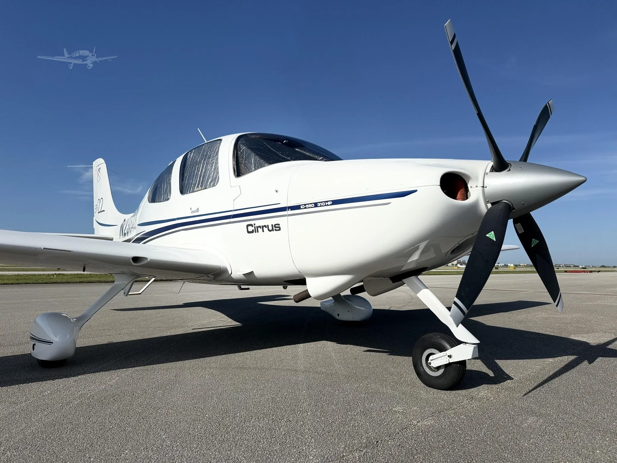 Exterior view of a 2002 CIRRUS SR22, N238AR.