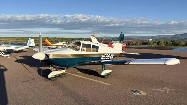 Exterior view of a 1966 PIPER CHEROKEE 180, N5924W.