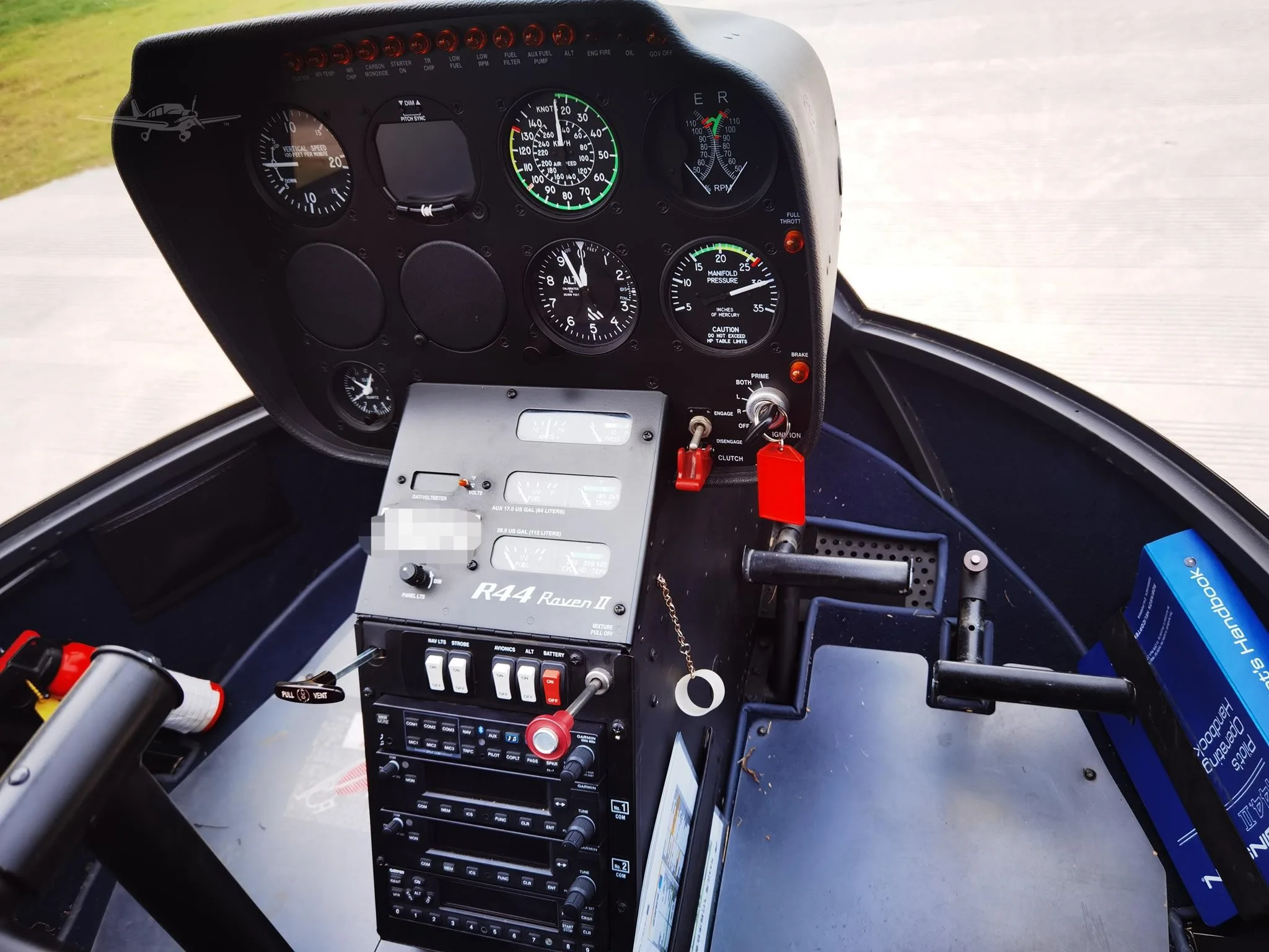 Cockpit and instrument panel of a 2014 ROBINSON R44 RAVEN I.