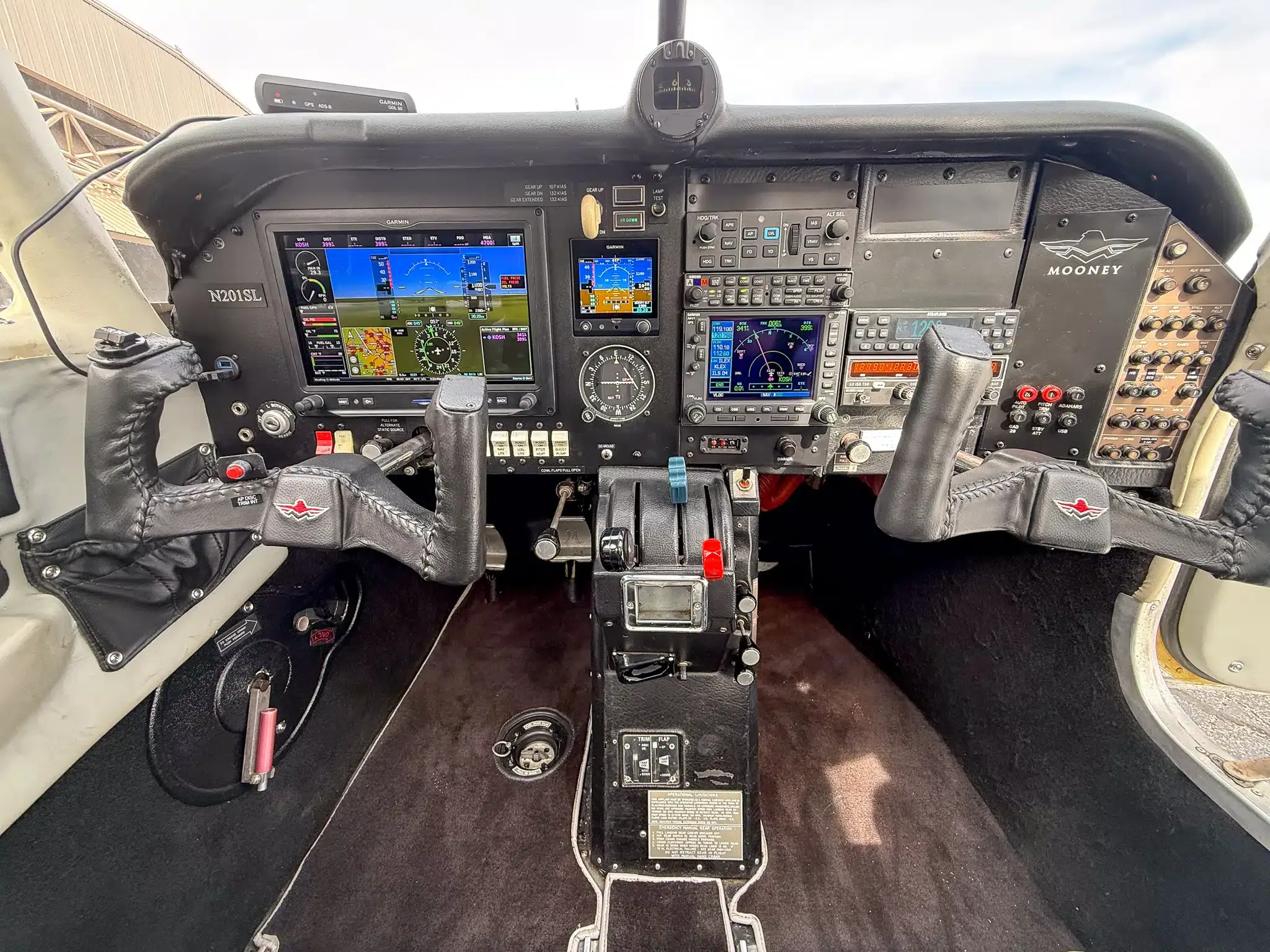 Cockpit and instrument panel of a 1977 Mooney M20J.