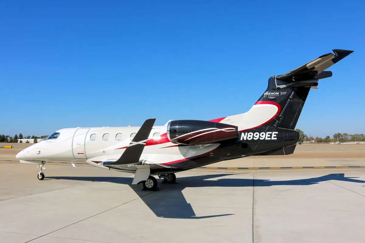 Exterior view of a 2013 Embraer PHENOM 300 | Leviate Air Group.