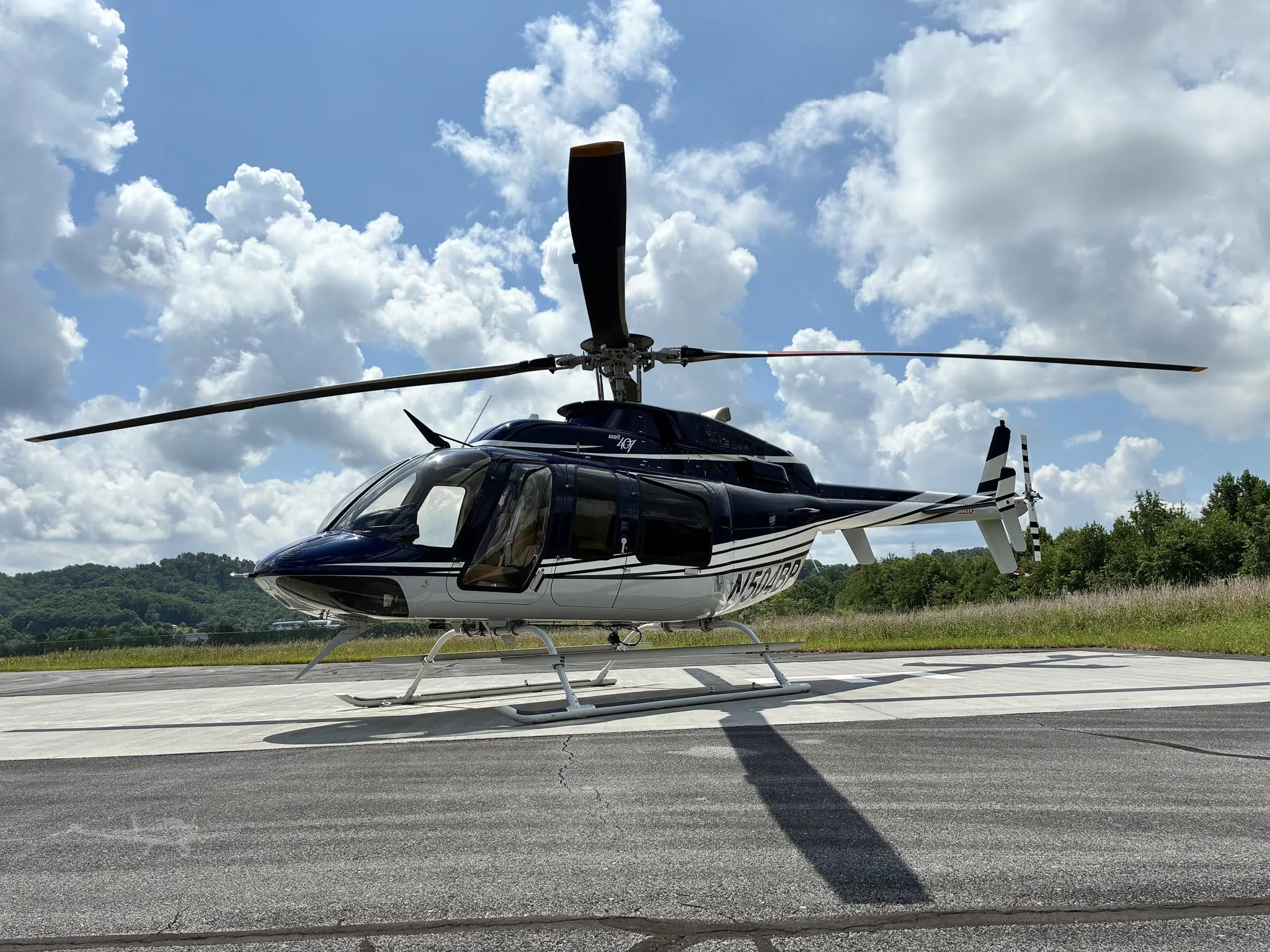 Exterior view of a 2004 BELL 407, N504BP.