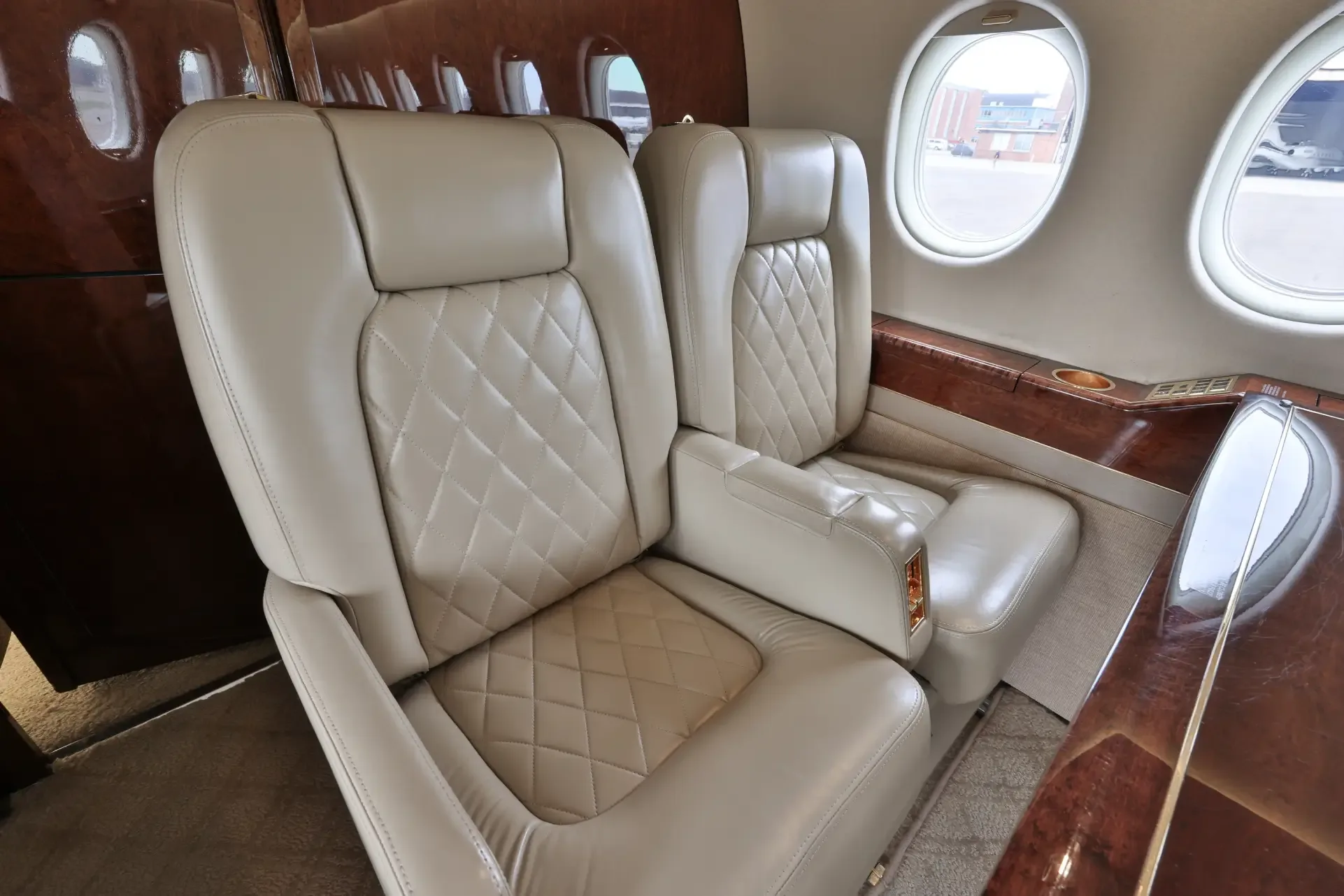 Cabin interior of a 1999 Dassault Falcon 2000.