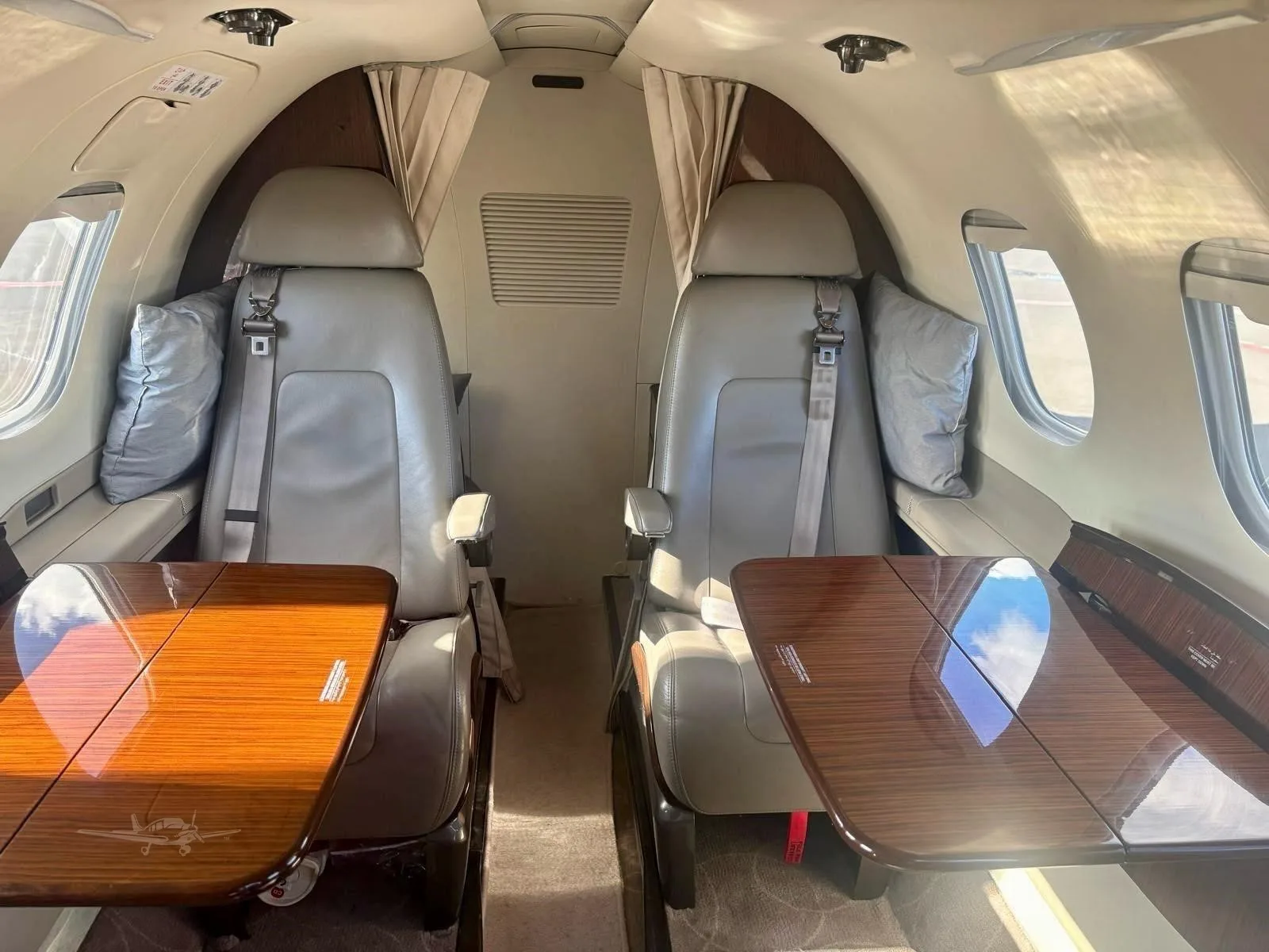 Cabin interior of a 2016 EMBRAER PHENOM 100E.