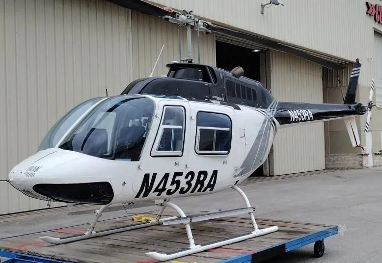 Exterior view of a 1981 BELL 206B III, N453RA.