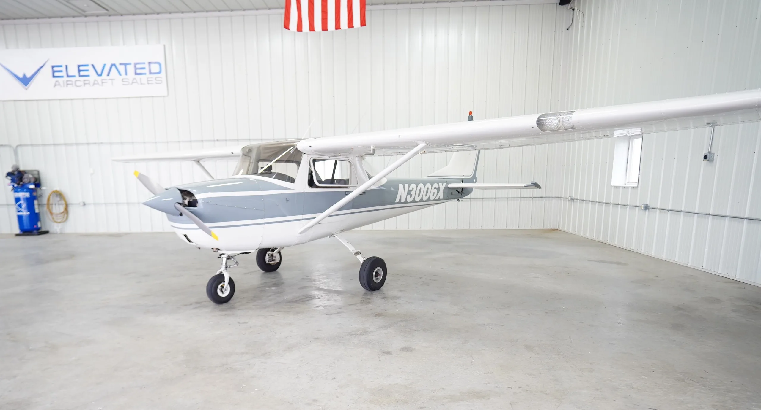 Exterior view of a Cessna 150F, N3006X.