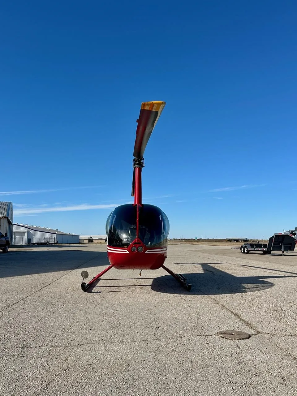 Exterior view of a 2006 ROBINSON R44 RAVEN II, N826CB.