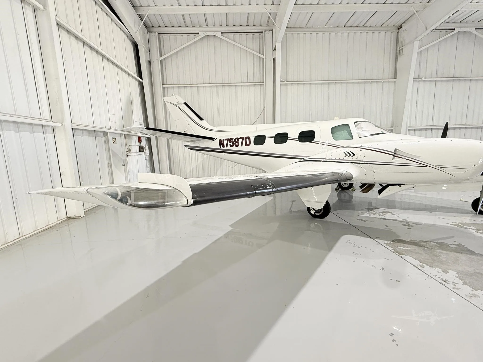Exterior view of a 1971 BEECHCRAFT A60 DUKE, N7587D.