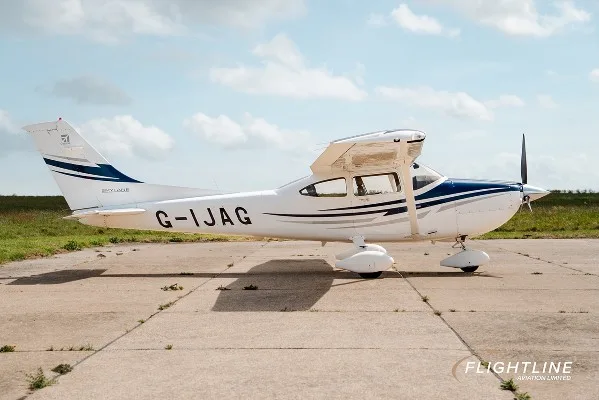 Exterior view of a 2005 Cessna 182T, G-IJAG.