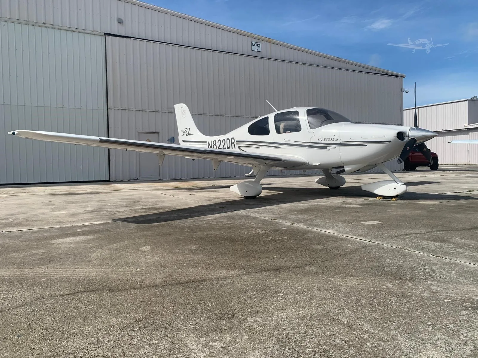 Exterior view of a 2003 CIRRUS SR22, N822DR.