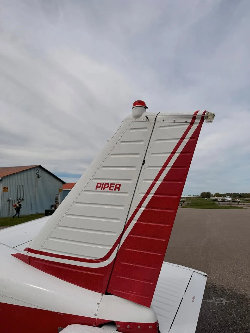 Exterior view of a 1971 PIPER CHEROKEE 140, CF-ZJN.