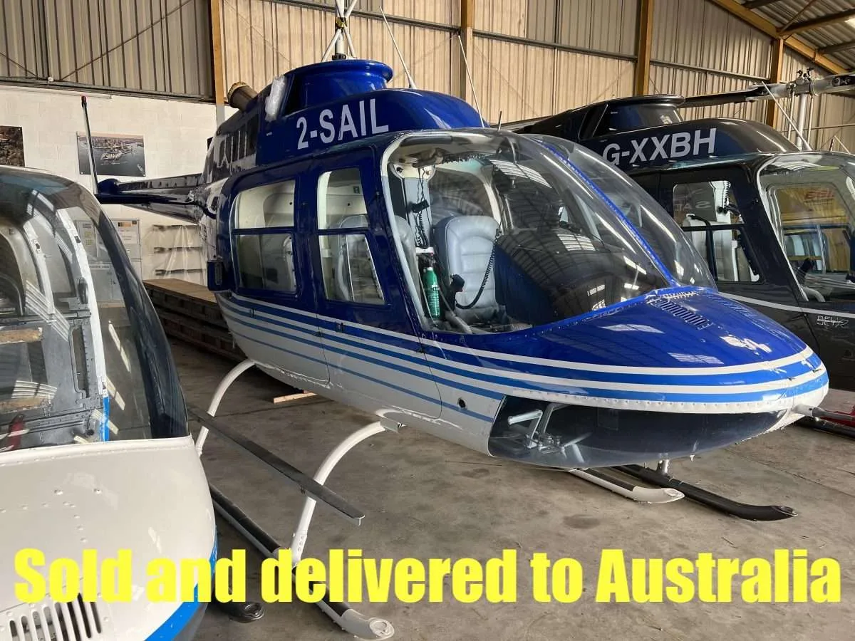 Exterior view of a 2002 Robinson R44 Raven I.