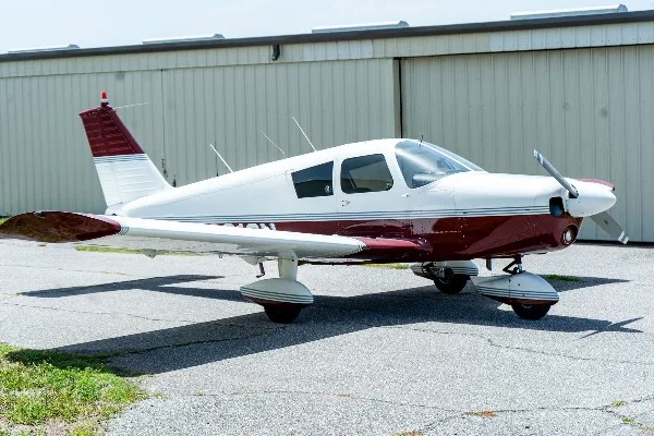 Exterior view of a 1968 Piper Cherokee 140, N8013N.